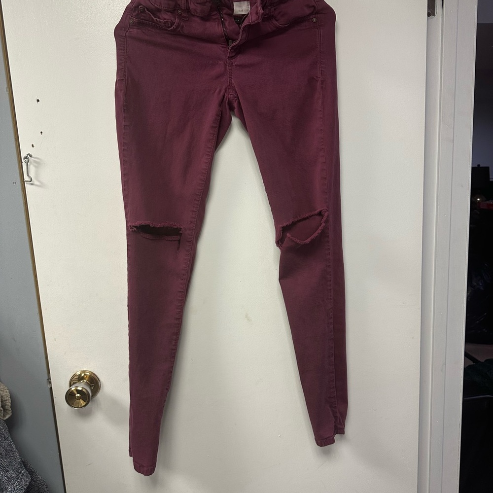 Burgundy Distressed Skinny Jeans